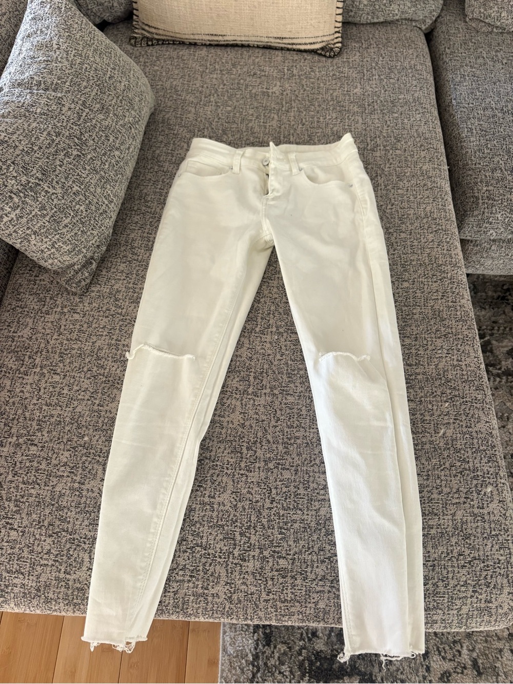 White Women's Skinny Jeans with Knee Distress